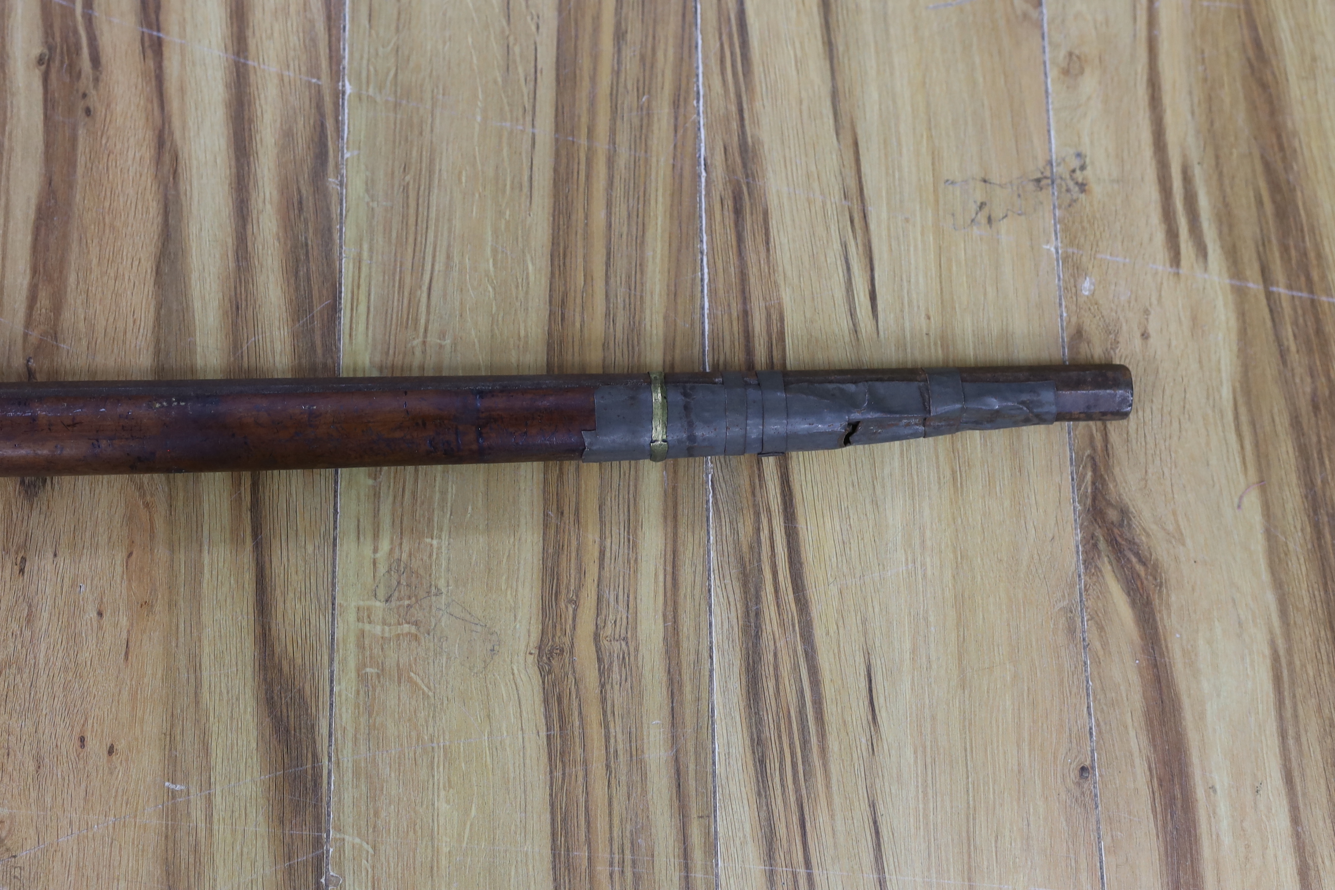 An Afghan percussion rifle and two shot flasks, rifle 143cm